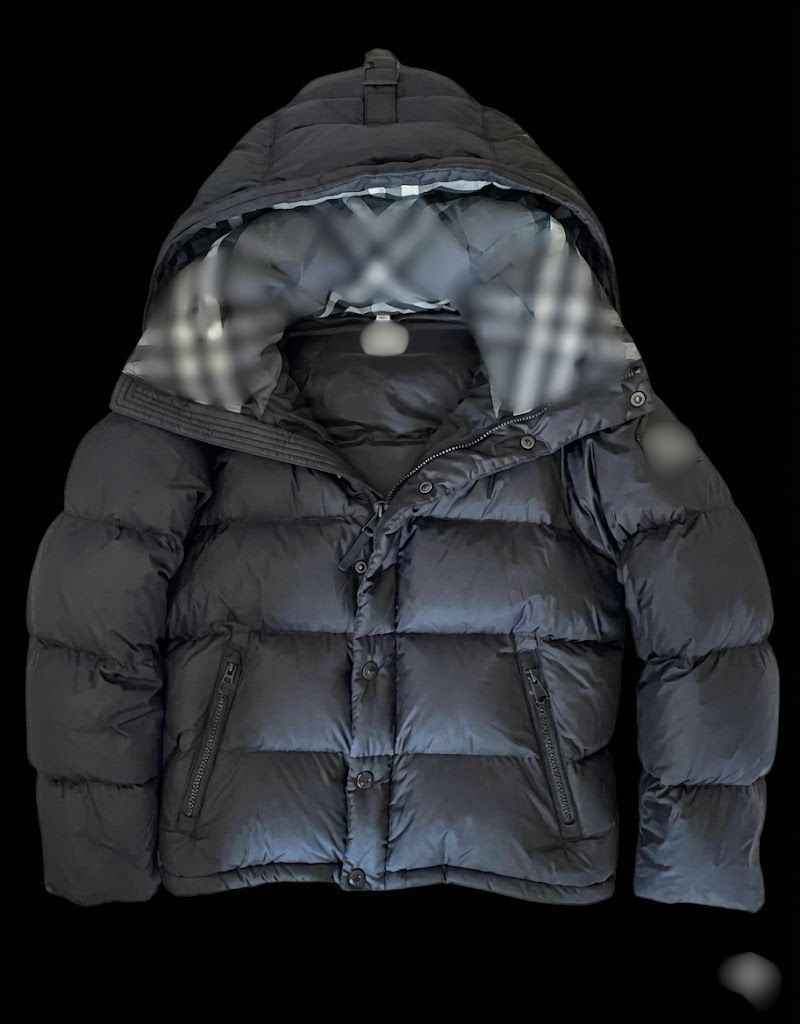 Black BB puffer jacket from Reselling Lab, showcasing the padded, quilted design with a high collar and front zipper closure.