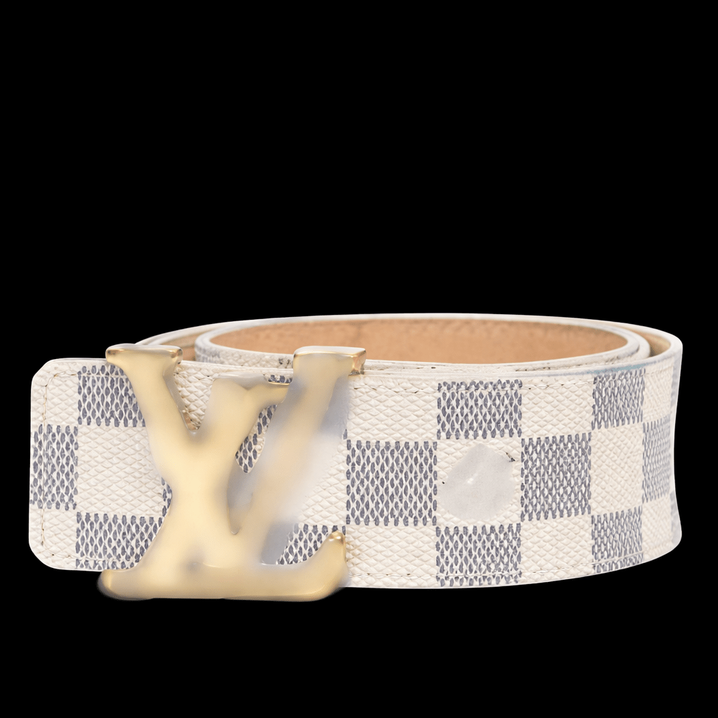 Black leather belt from Theplugcrew with a silver buckle, displayed on a plain white background.