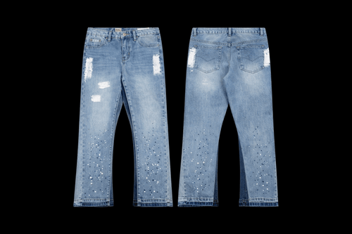 Pair of DEBT flared jeans from Reselling Lab with a high waist and distressed denim, showcasing the trendy fashion style.