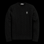 Close-up of a cozy horse knit sweater by Theplugcrew, featuring detailed patterns and soft fabric in natural tones.