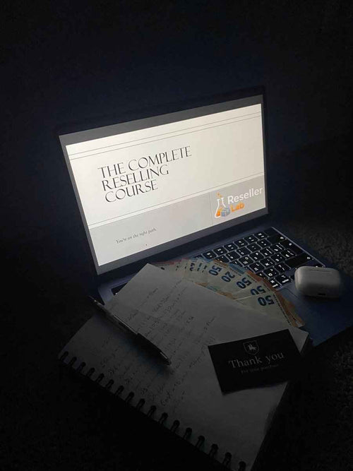 Open book titled "Complete Reselling Guide" by Reselling Lab, featuring detailed pages on reselling strategies and tips.