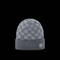 Reselling Lab VITTON beanie in black, featuring a snug knit design and logo patch, perfect for casual winter wear.