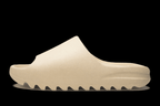 Reselling Vendor Zeezy slides in black, featuring wide straps and comfortable sole, suitable for casual wear and lounging.