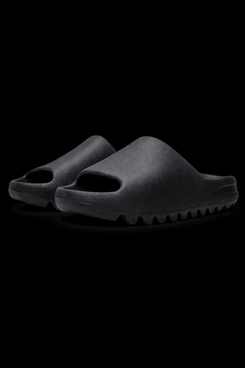 Pair of Zeezy Slides from Reselling Vendor, featuring comfortable slip-on design and casual style, shown on a clean background.